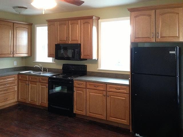 Large Country Kitchen - Lots of Natural Light - New laminate flooring installed not shown.