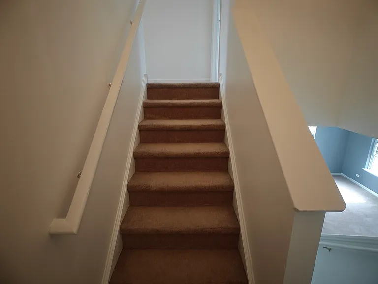 staircase to the rooms (upstairs)
