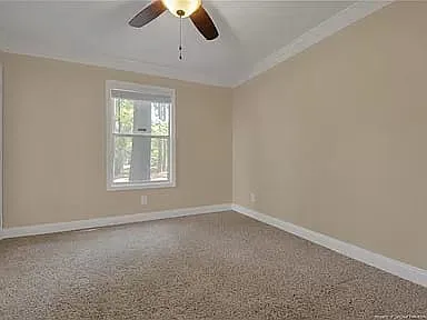 Guest Bedroom on opposite side of condo that provides privacy with a door onto balcony. Excellent for guests or roommates.