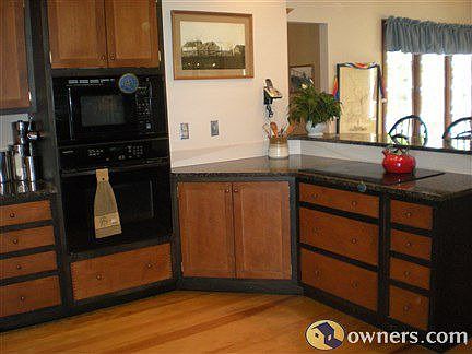 Gourmet kitchen/granite countertops/view the creek