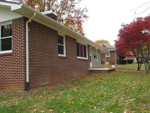 Left corner of house.