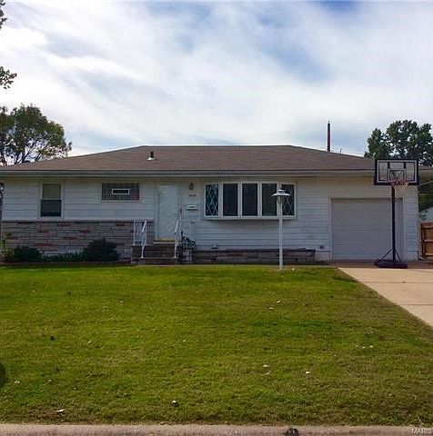 Front Exterior showing well maintained lawn