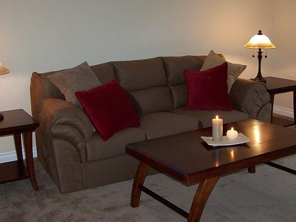 Nice sized living room with new carpet paint and more.
