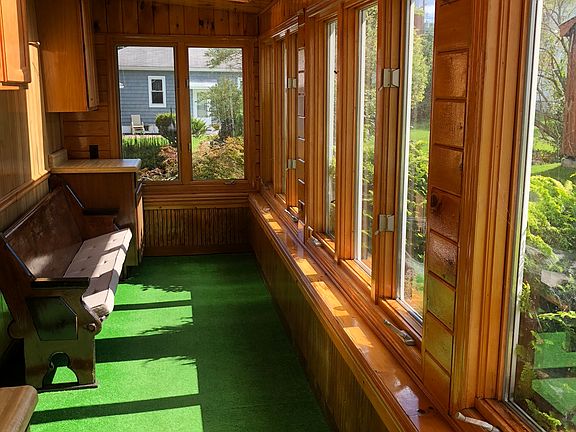 Sunroom behind garage