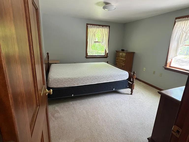 First bedroom with queen sized bed
