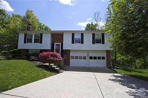 This home is surrounded by mature trees and lush landscaping. You will love the convenience of the two car front entry garage with keypad access.