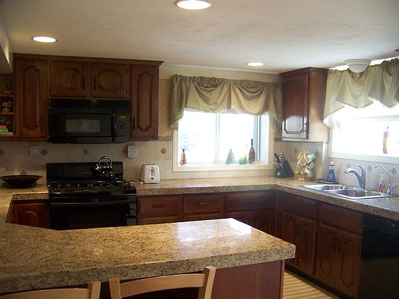 Custom Cherry Cabinets & Granite Countertops