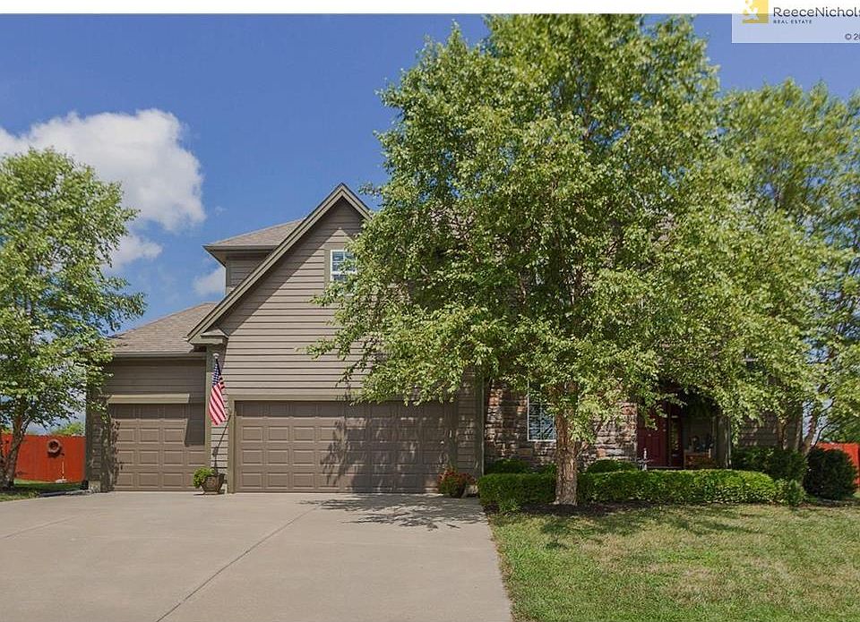 Welcome to 2128 W Grace Street in Olathe, KS.   This home is located in the Shadow Ridge community, just down the street from the new Olathe West High School.