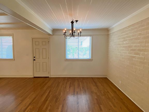 Dining room with chandelier.