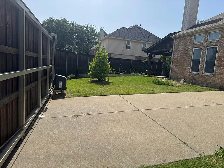 Backyard - electric gate view