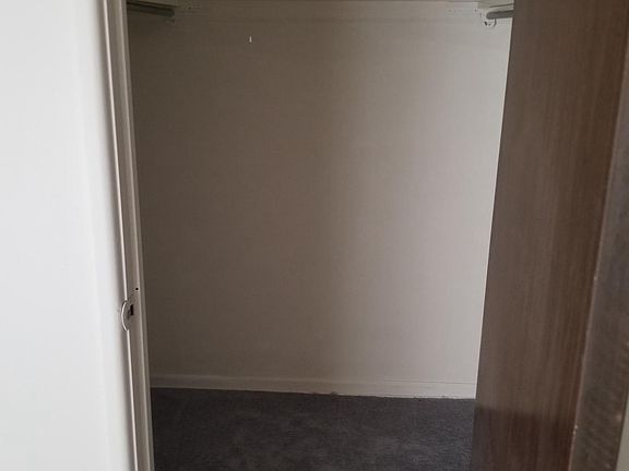 Walk-in closet in master bedroom