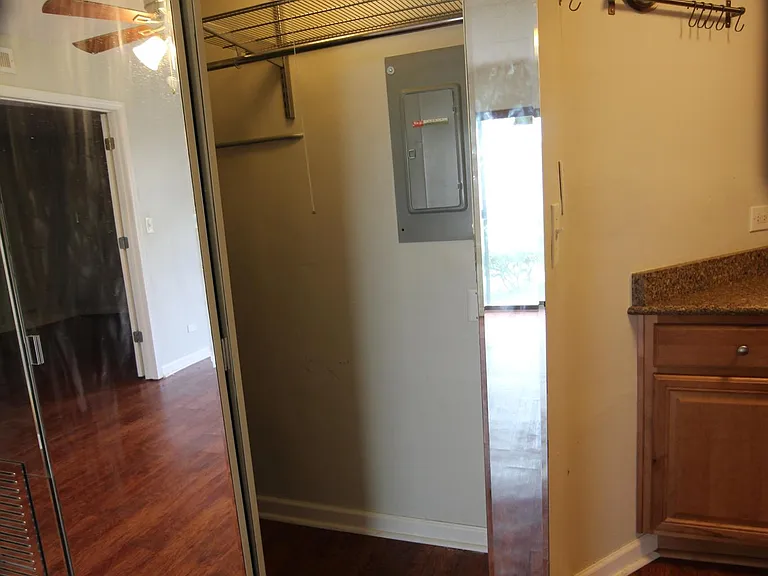 Coat closet/Kitchen extra storage.