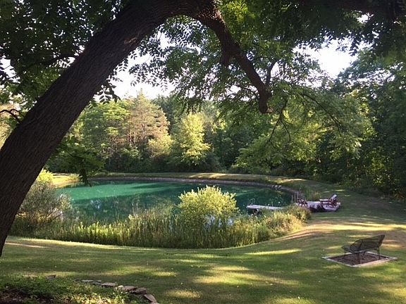 1/2 acre, 20 ft deep pond