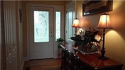 ORNATE DOOR INTO FOYER