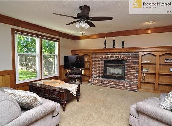 This well-built home boasts classic styling with wainscoting, deep molding and built-ins