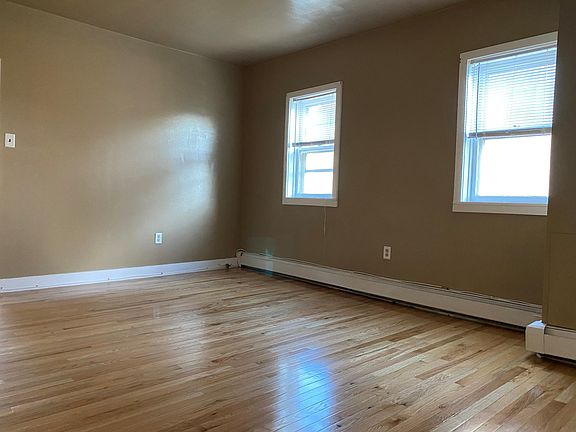 Large bright living room with double windows