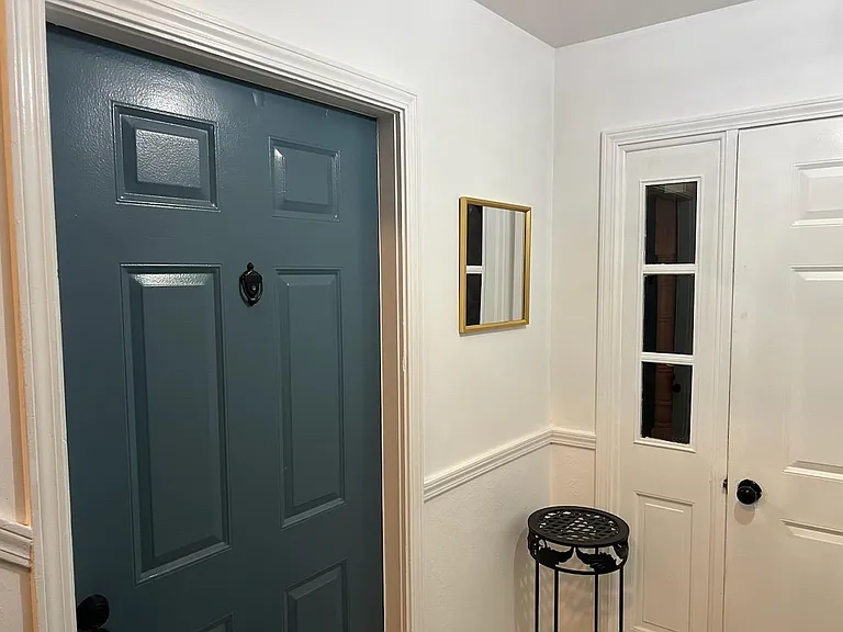 Door to first floor unit.