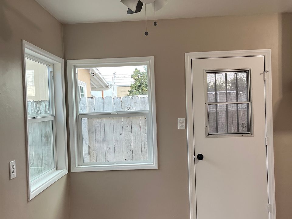 Kitchen with backdoor to Backyard