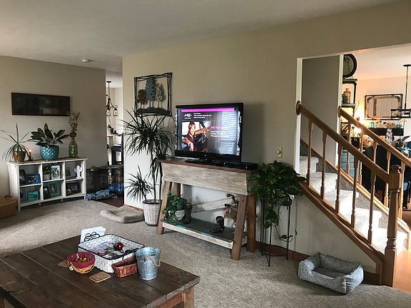 Open to kitchen and dining