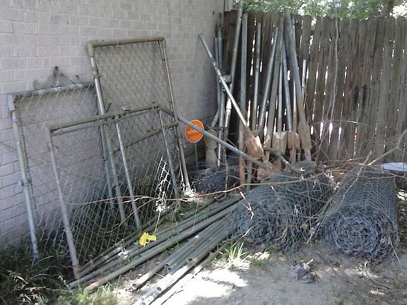 Side of house w/ extra fence