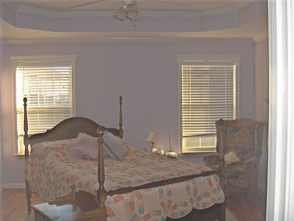 first floor master w/inlaid hardwood