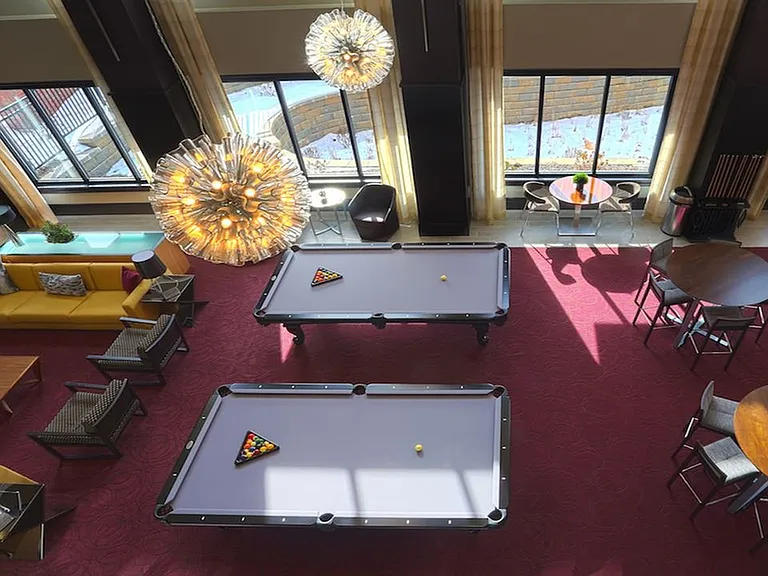 Challenge your neighbors to a game of pool or cozy up to our fireplace and catch up on your favorite shows