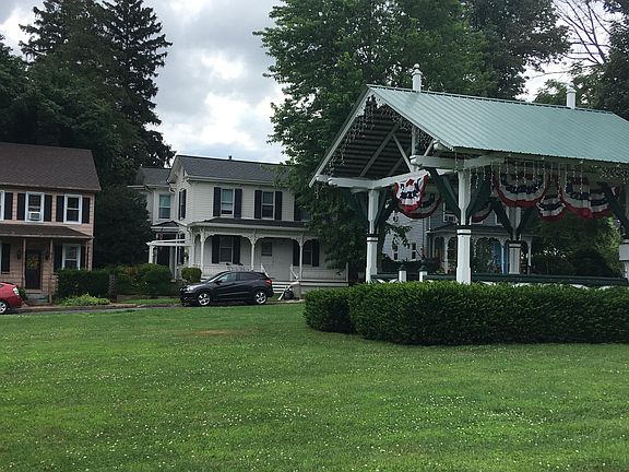 A town park, apartment in background.