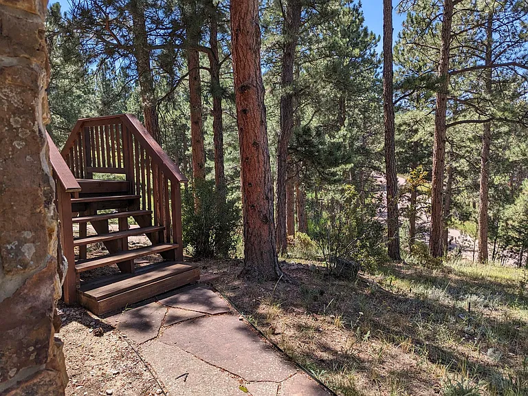 Stairs coming down from the front deck