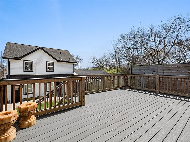 Large rear deck perfect for outdoor dining and entertaining.