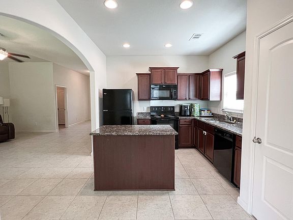 Kitchen with granite countertops