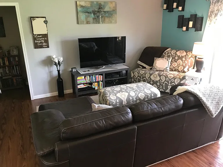 Family area with room for several couches / chairs