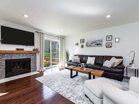 Entertain guests in this expansive living room, complete with new hardwood floors, trim, paint, rece