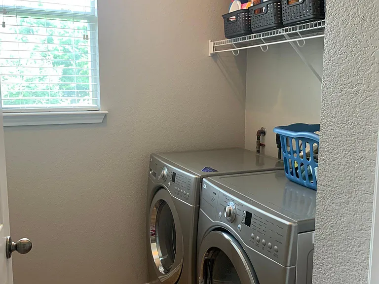 Separate utility and laundry room. Washer and Dryer not included.