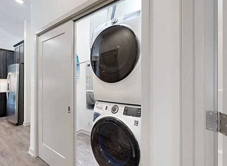 Tackle laundry effortlessly with this in-home washer and dryer, designed for your convenience.