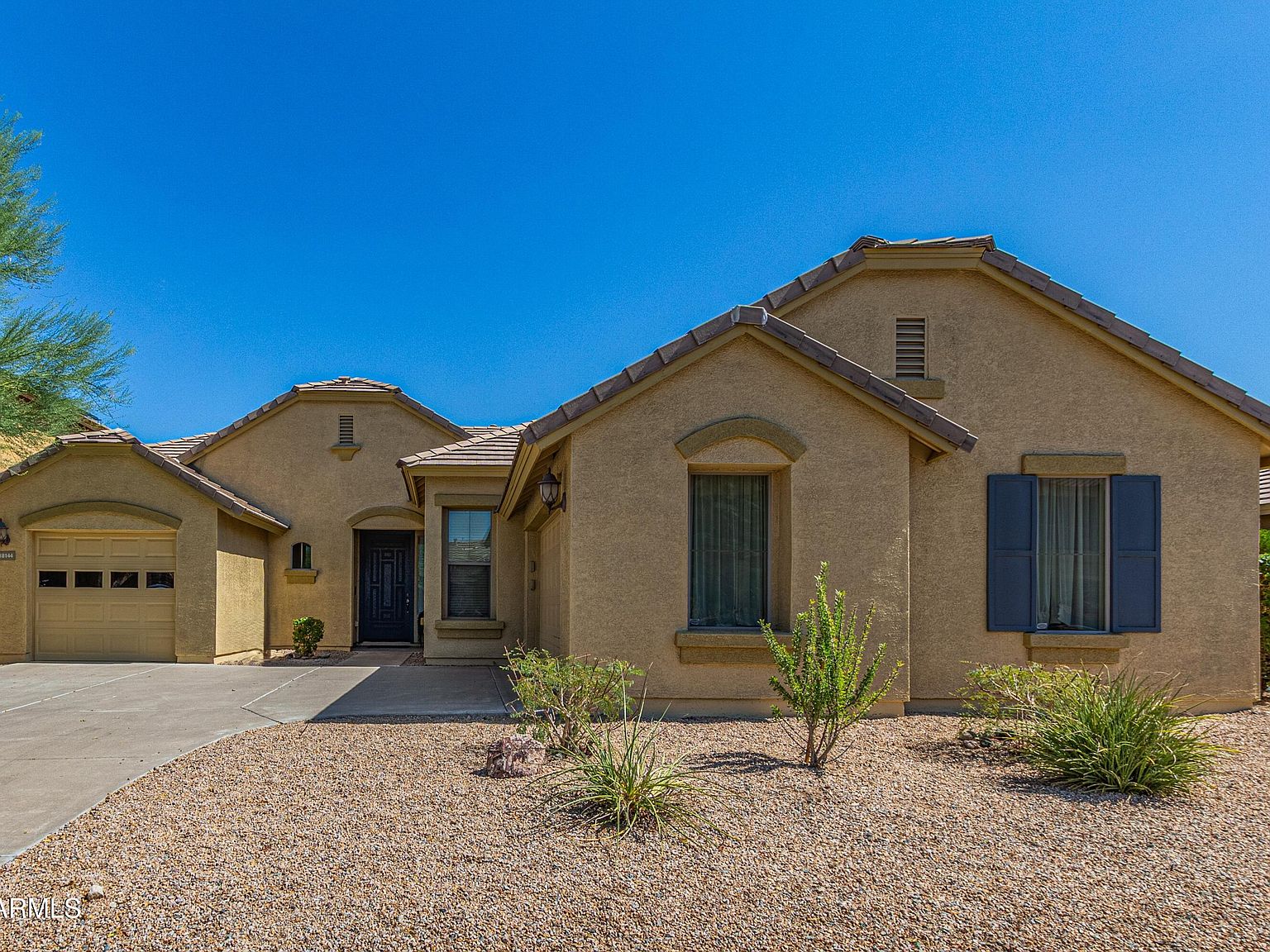 18144 W Wind Song Ave