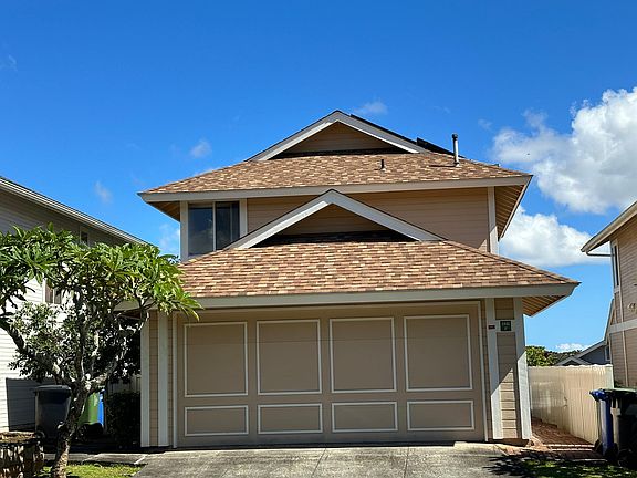 FRONT OF HOUSE LOCATED ON KAAHUMANU STREET. LOTS OF AMPLE PARKING AVAILABLE.