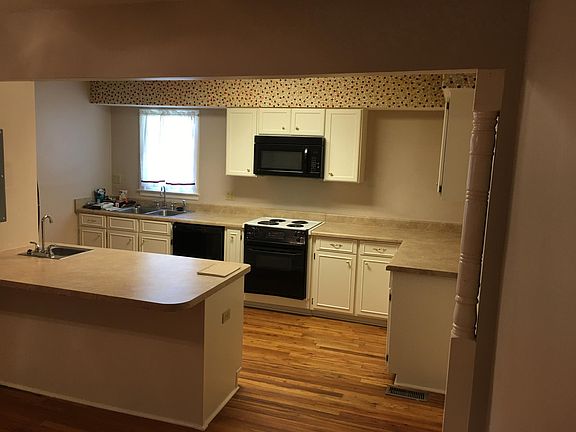 Spacious kitchen with all appliances.