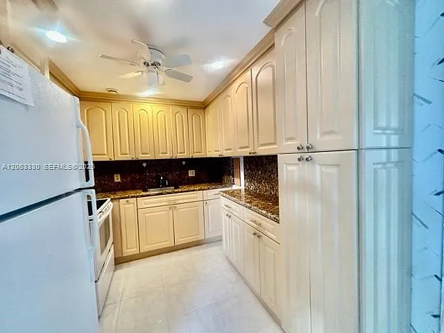 801 SW 133rd Ter #105K — Photo 24