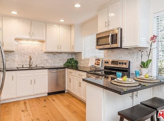 Large exquisite kitchen with granite counters