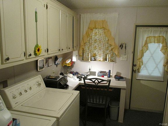 Coming into office and laundry (has closet too)