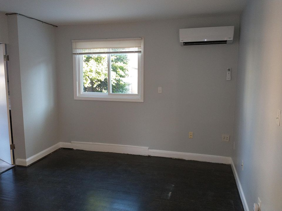 Living/Dining Area showing newly installed air conditioning/heating unit. Super quiet...listen closely, you can't even hear the A/C