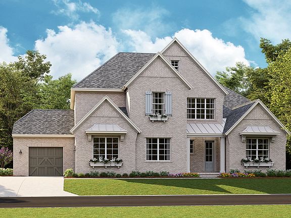 Monterey - English Cottage l 3-Car Side Load Garage Note Renderings may show optional feature