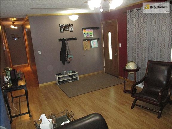 Living room view of the hallway that leads to the bedrooms.
