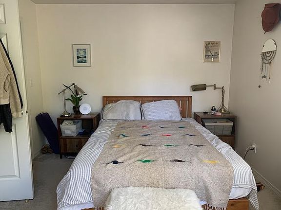 Master bedroom with walk-in closet on left