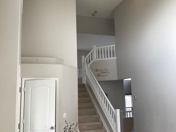 Stairs to bedrooms.