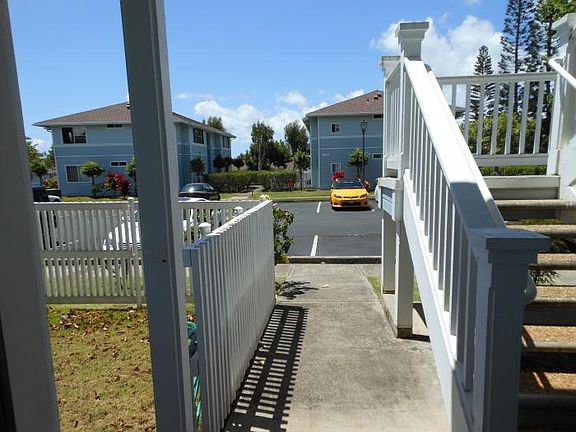 front door looking out to 2 parking spots right therel