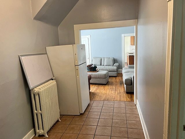 ENTRYWAY w/ EXTRA FRIDGE