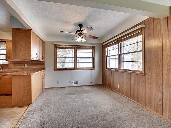 Dining area flows from kitchen and living room