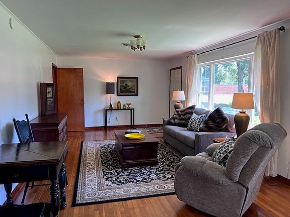 LIVING ROOM WITH GAME TABLE. TELEVISION OPTIONAL