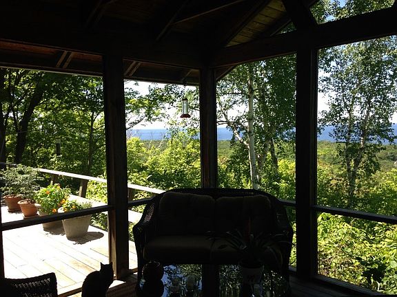 Amazing View from Screened Porch : The large screened porch is a place for relaxation and amazing ba
